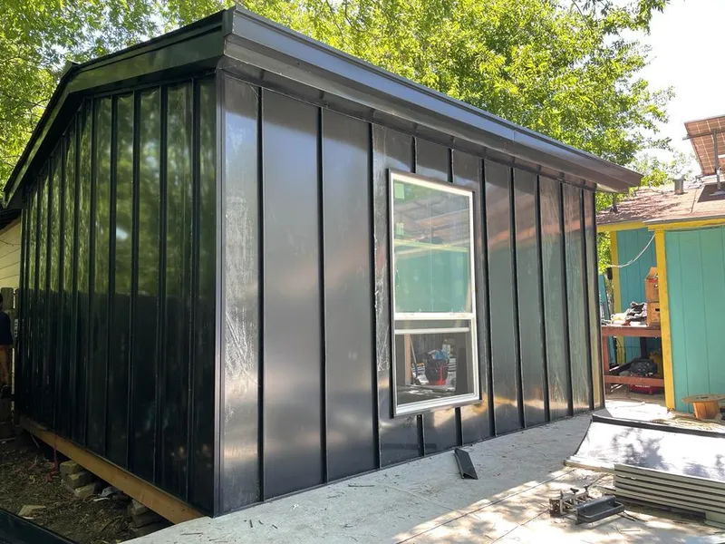 Black standing seam metal wall panels for Roof Inspection in Accokeek